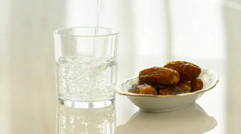Arabic dates and drinking water Stock-Footage 33691142