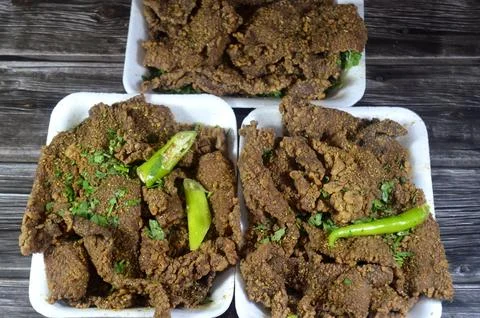 Arabic deep fried beef liver slices, beef liver covered with wheat bran, (K.. Stock Photos