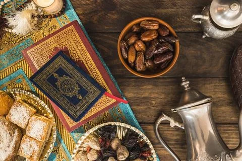 Arabic desserts near books Resolution and high quality beautiful photo Stock Photos