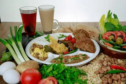 Arabic Dynamite breakfast platter with flafel, marinated fried eggplant, ma.. 库存照片