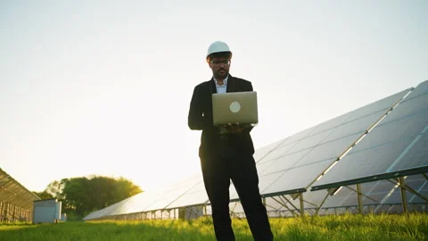 Arabic engineer working with laptop in solar power plant Video stock 314408390
