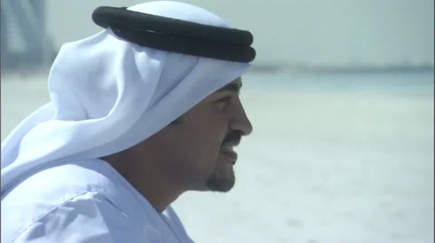 An Arabic father and son on a beach. Stock Footage 46864402