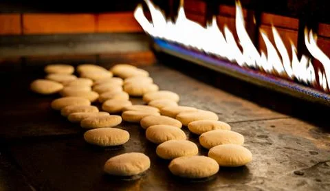 Arabic flat bread baked in the oven. Bakery items Stock-Fotos