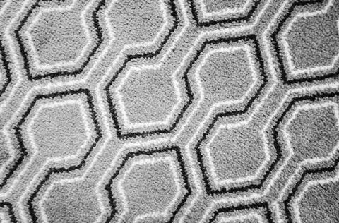 Arabic geometric carpet pattern, black and white lines over gray background Stock Photos