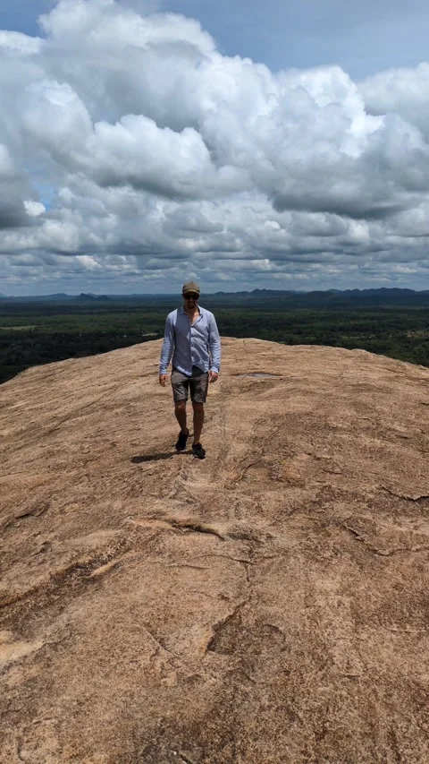 Arabic guy exploring the ancient lion rock landmark in Sri Lanka 스톡 동영상 322011209
