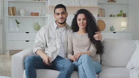 Arabic Hispanic man husband loving boyfriend and beautiful caucasian woman with Stock Footage 155348831