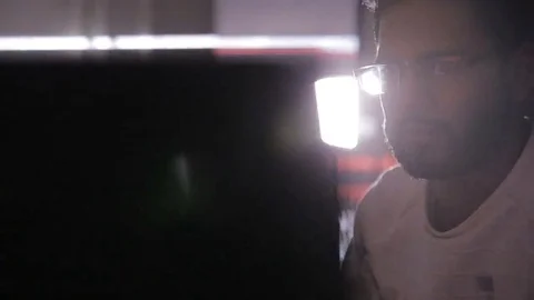 Arabic IT specialist working on computer at night. Hacker breaking computer code Stock Footage 69207512