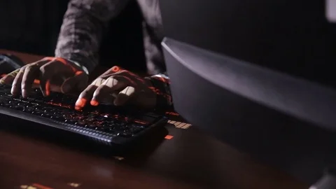 Arabic IT specialist working on computer at night. Hacker breaking computer code Stock Footage 71583404