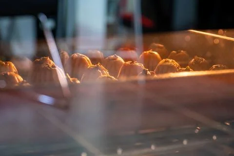 Arabic Keto Eid kahk inside the oven while being baked Stock Photos