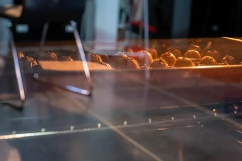 Arabic Keto Eid kahk inside the oven while being baked Stock Photos