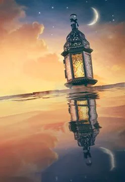 Arabic lantern with burning candle Stock Photos