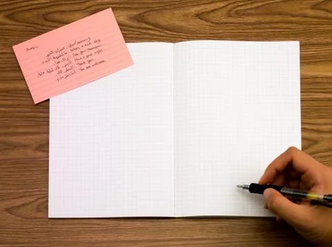 Arabic; Learning New Language Writing Words on the Notebook Stock Photos