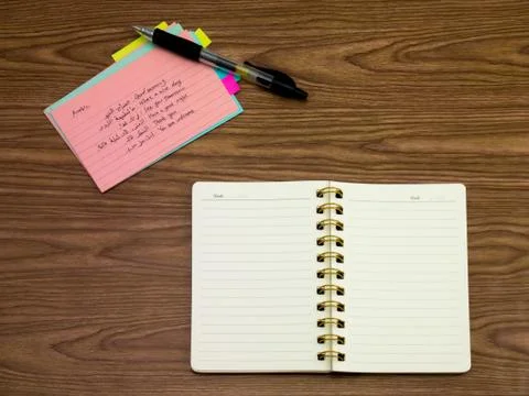 Arabic; Learning New Language Writing Words on the Notebook Stock Photos