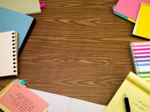 Arabic; Learning New Language Writing Words on the Notebook Stock Photos