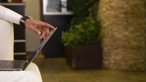 Arabic man working on laptop and mobile Stock Footage 73518176