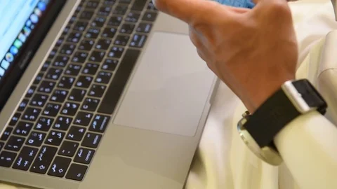 Arabic man working on laptop and mobile Stock Footage 73518205