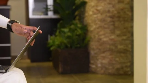 Arabic man working on laptop and mobile Stock Footage 73518211