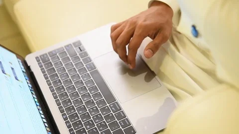 Arabic man working on laptop and mobile Stock Footage 73518501