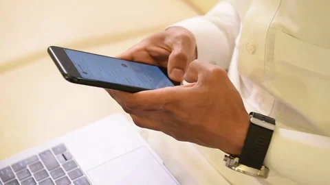 Arabic man working on laptop and mobile Stock Footage 73518612