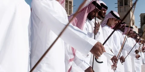 Arabic men performing traditional dance with sticks. Stock Footage 124592584