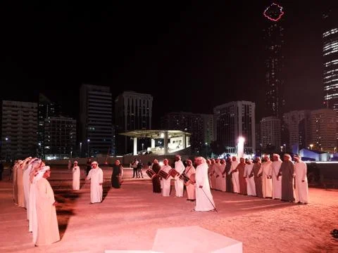 Arabic Middle Eastern men performing a traditional dance in Abu Dhabi Stock Photos