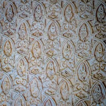 Arabic moorish design pattern with white plaster on the walls of the Alhambra Stock Photos