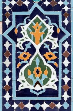 Arabic mosaic pattern as a part of an ancient wall decoration Stock Photos