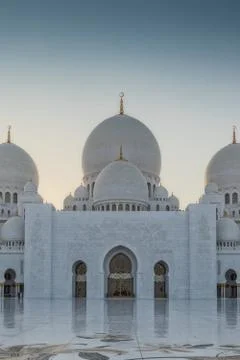 Arabic mosque facade with domes, with sunset light. Great Mosque. UAE. Abu dh Stock Photos