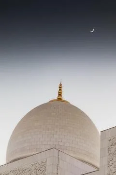 Arabic mosque facade with domes, with sunset light. Great Mosque. UAE. Abu dh Stock Photos