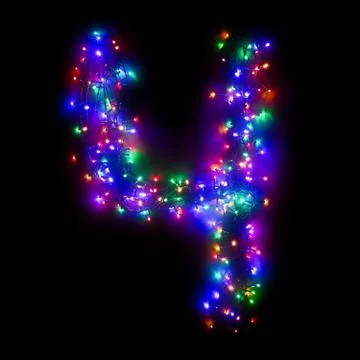 Arabic numeral "4" from a multi-colored electric garland on a black isolated  Stock Photos