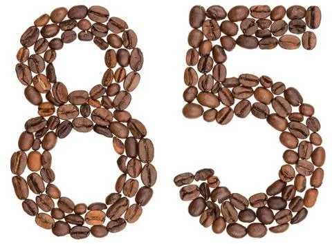 Arabic numeral 85, eighty five, from coffee beans, isolated on white backgrou Stock Photos