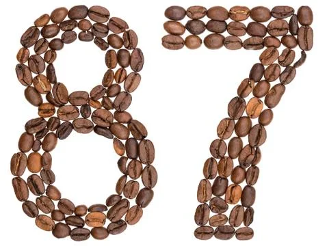Arabic numeral 87, eighty seven, from coffee beans, isolated on white backgro Stock Photos