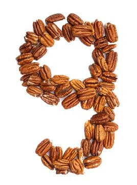 Arabic numeral "9"  from pecans on a white isolated background. Food pattern Illustrazione stock