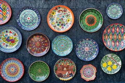 Arabic painted ceramic plates on the wall. Stock Photos