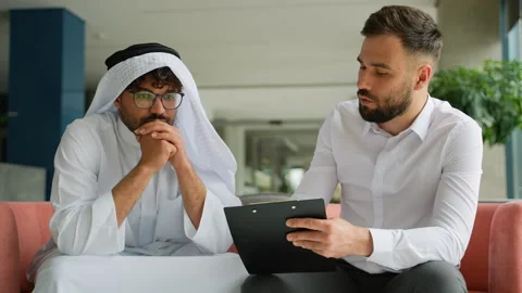 Arabic patient discussing problems with psychologist during therapy session Video stock 316730187