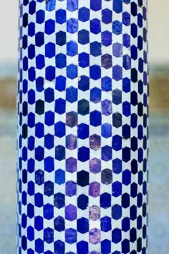 Arabic pattern on a tiled wall of a Muslim building, abstract background and Stock Photos