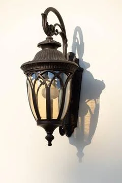 Arabic style lantern on the wall Arabic style lantern on the wall. High qu... Stock Photos