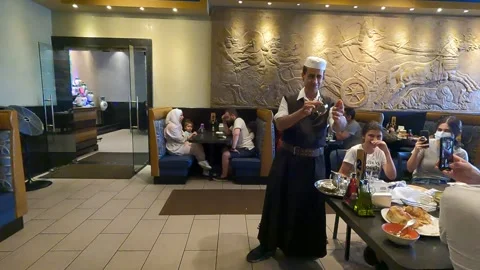 Arabic Tea Server Ishrat Restaurant Sterling Heights, Michigan 4K 動画素材 155869686