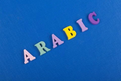ARABIC word on blue background composed from colorful abc alphabet block wo.. Stock Photos
