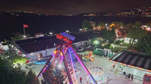 Araffe rides at night at a fair. Stock Footage 284659707