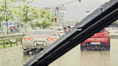 Araffe view a rainy street from inside. Stock Footage 284669261