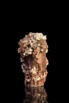 Aragonite gemstone with reflection, black background Stock Photos