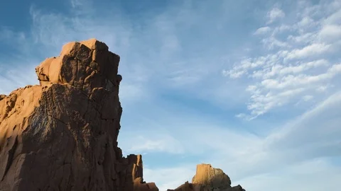 Arbatax red rocks, low angle panning sky view. Vidéo 120607724