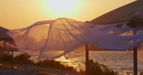 Arbor with developing curtains on the beach Video stock 111371501