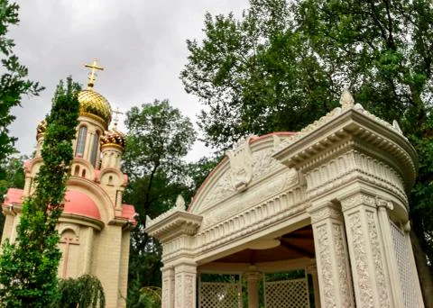 Arbor in the eastern style and the Russian church Stock Photos