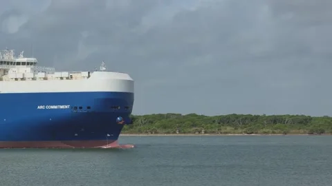The ARC COMMITMENT vehicles carrier ship heading out of the Galveston Channel Stock Footage 333794230