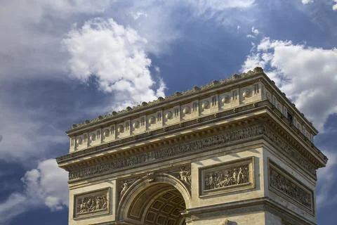 Arc de Triomphe (against the background of sky with clouds), Paris, France Stock Photos