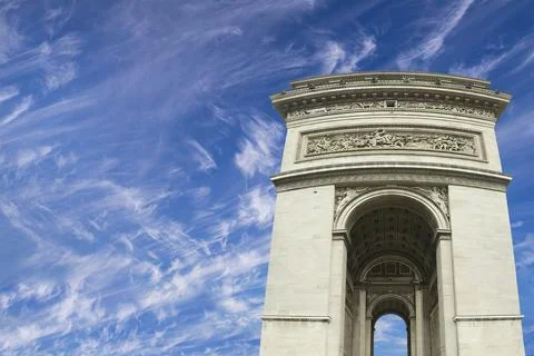 Arc de Triomphe (against the background of sky with clouds), Paris, France Stock Photos