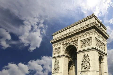 Arc de Triomphe (against the background of sky with clouds), Paris, France Stock Photos