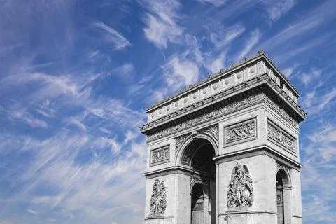 Arc de Triomphe (against the background of sky with clouds), Paris, France Stock Photos